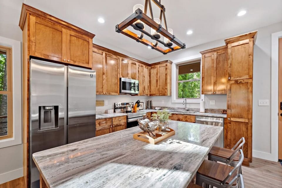 Handmade custom cabinets in the fully stocked kitchen