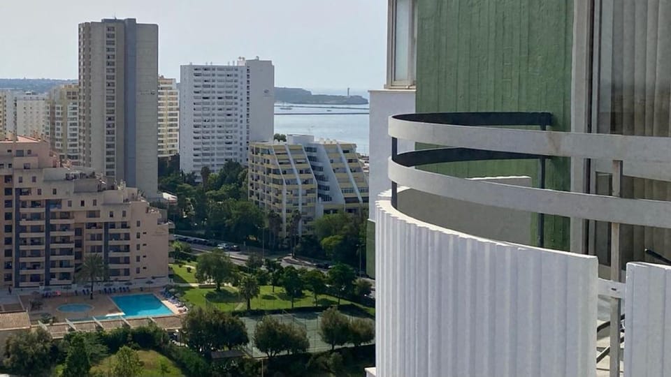 Dive into the refreshing pool or bask in the sun, surrounded by the vibrant energy of this modern complex.
#SwimmingPool #SunnyDays #LovelyStay