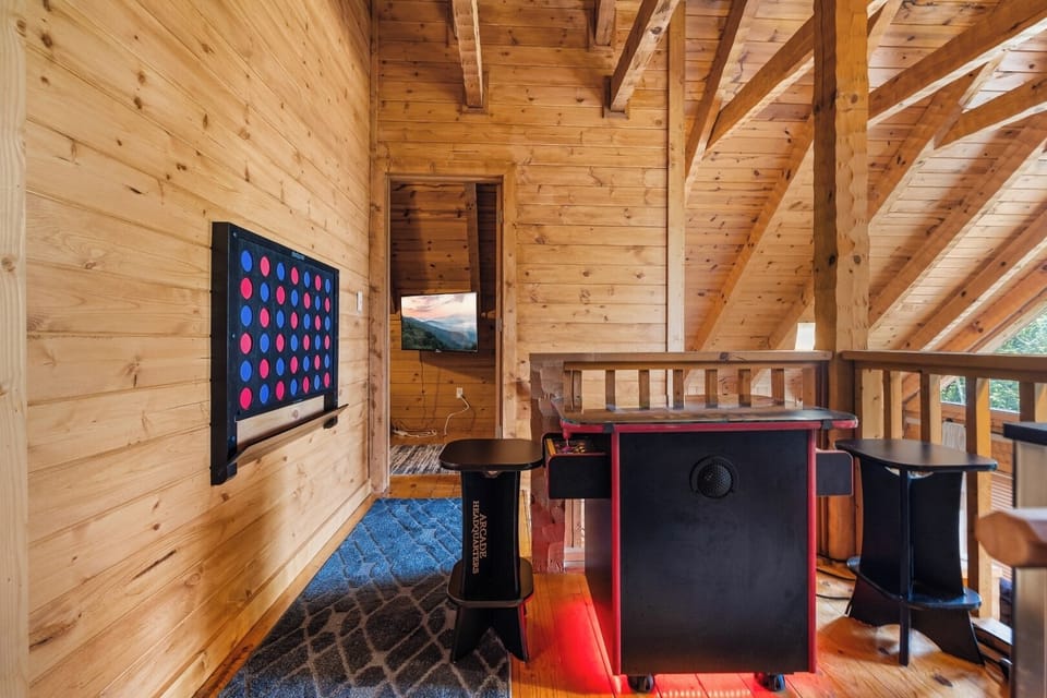 Large wall-mounted Connect 4 game in loft for family fun!