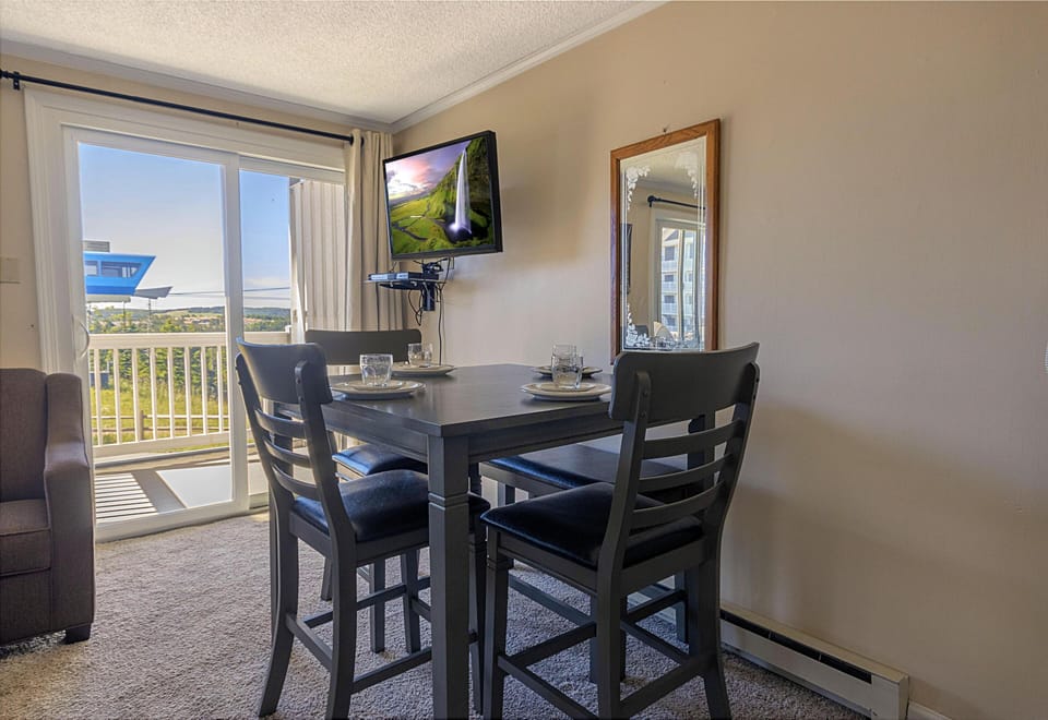 Gather with your group for meals at the table for four.