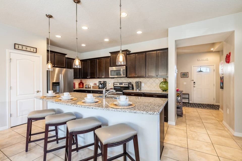 7.	Serve up your delicious waffles or quick snack at the breakfast bar with seating for 4