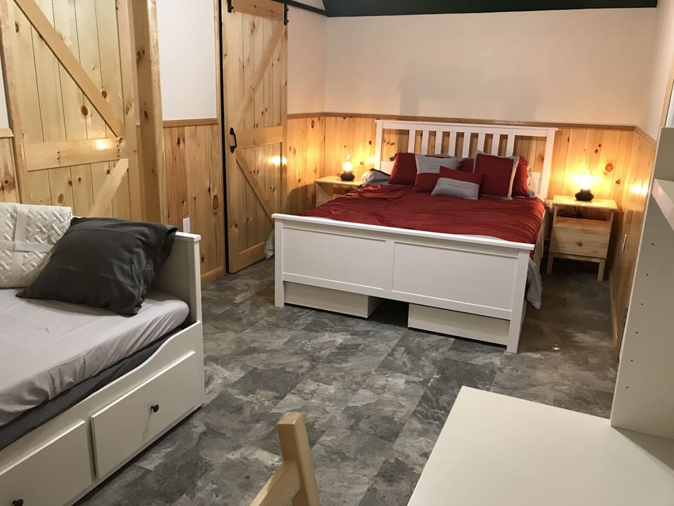 Bedrooom - queen bed, daybed pulls into queen, desk and chair.