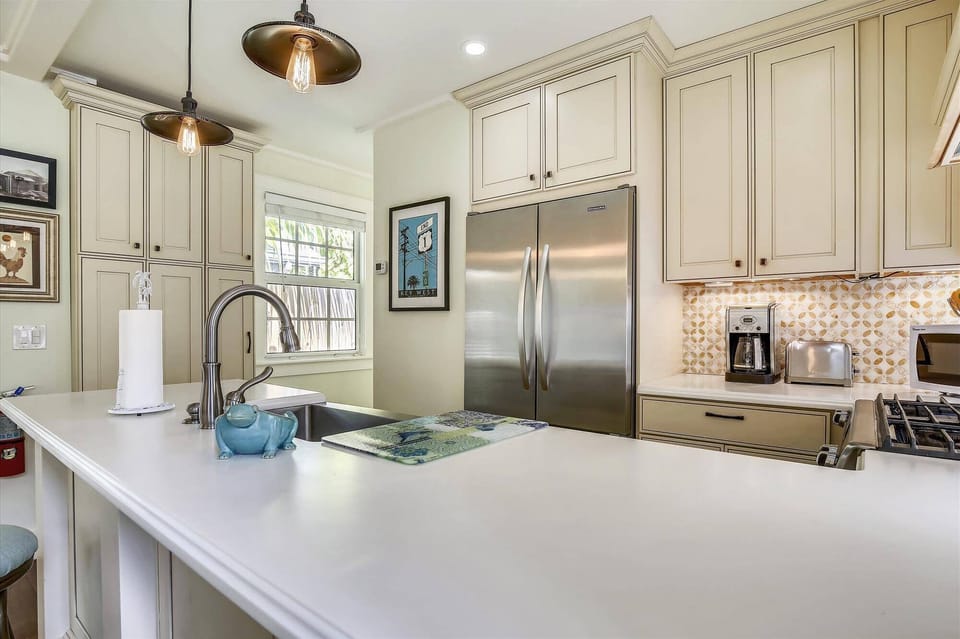 Cook up a feast in the sleek kitchen.