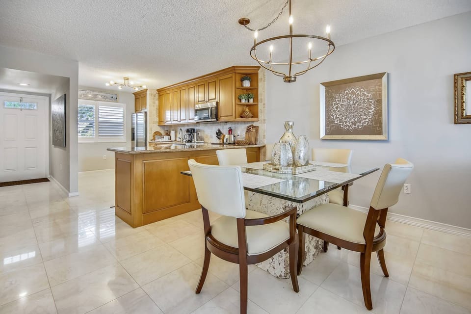 Dining area connects the kitchen and living area.