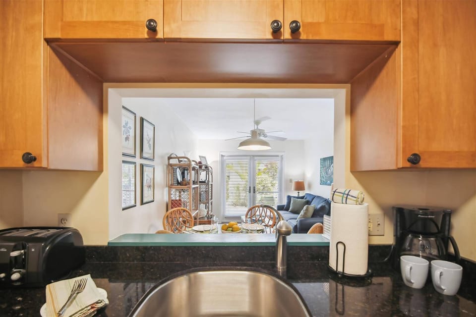Kitchen features a pass-through.