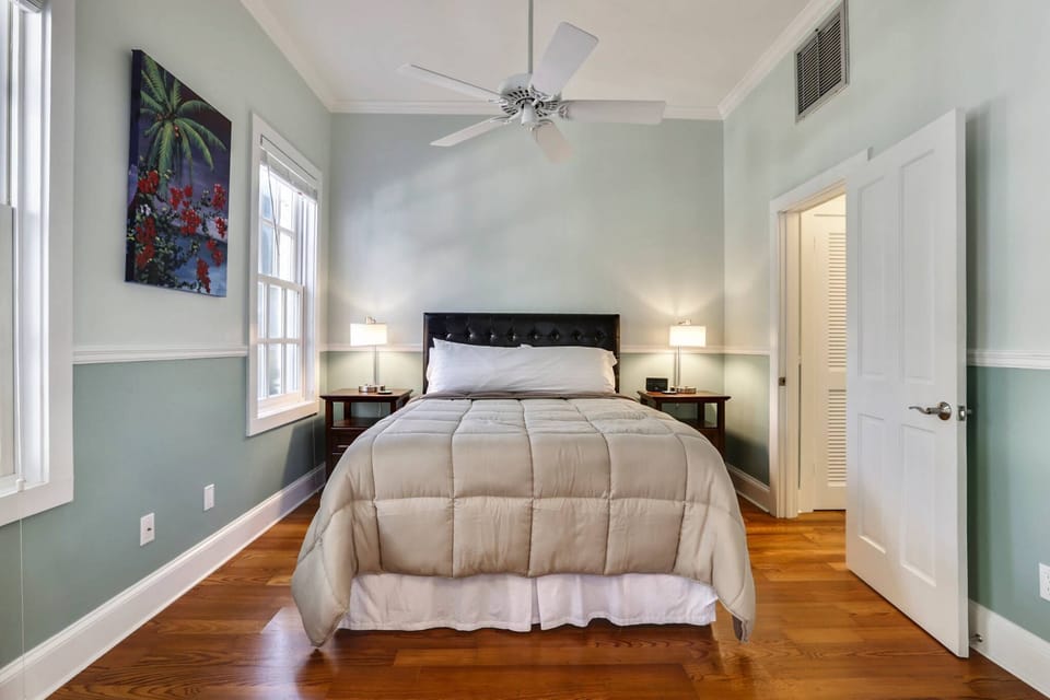 Primary bedroom features a queen bed.