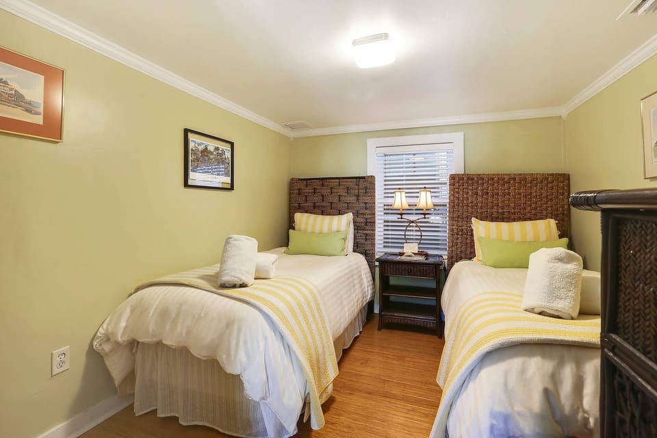 Bedroom 2 features two twin beds.
