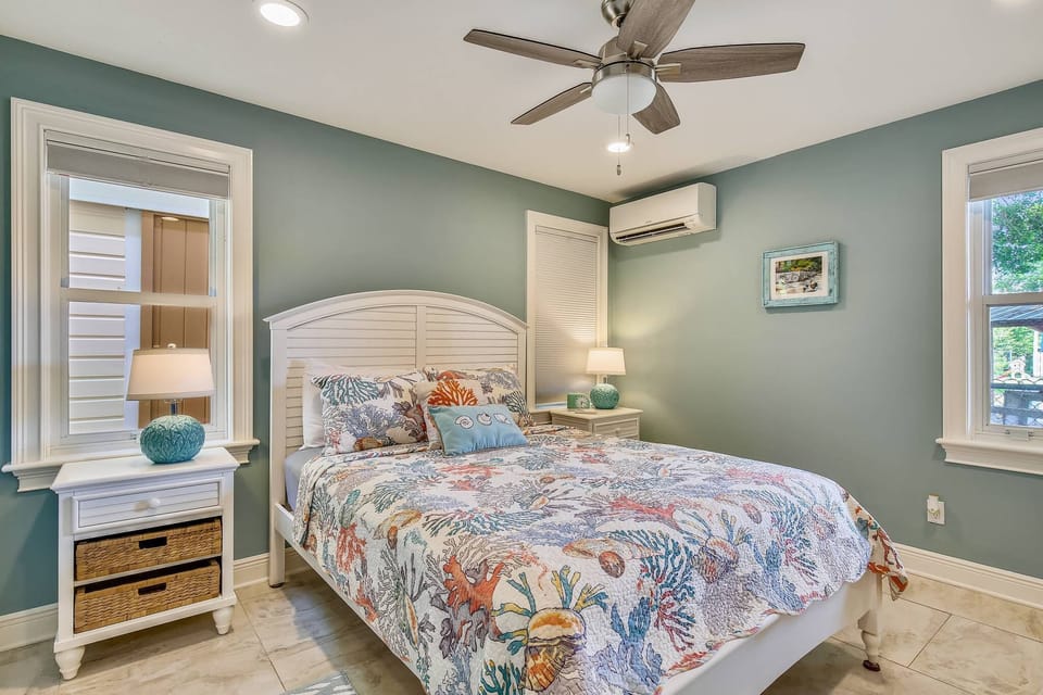 Primary bedroom features a queen bed.