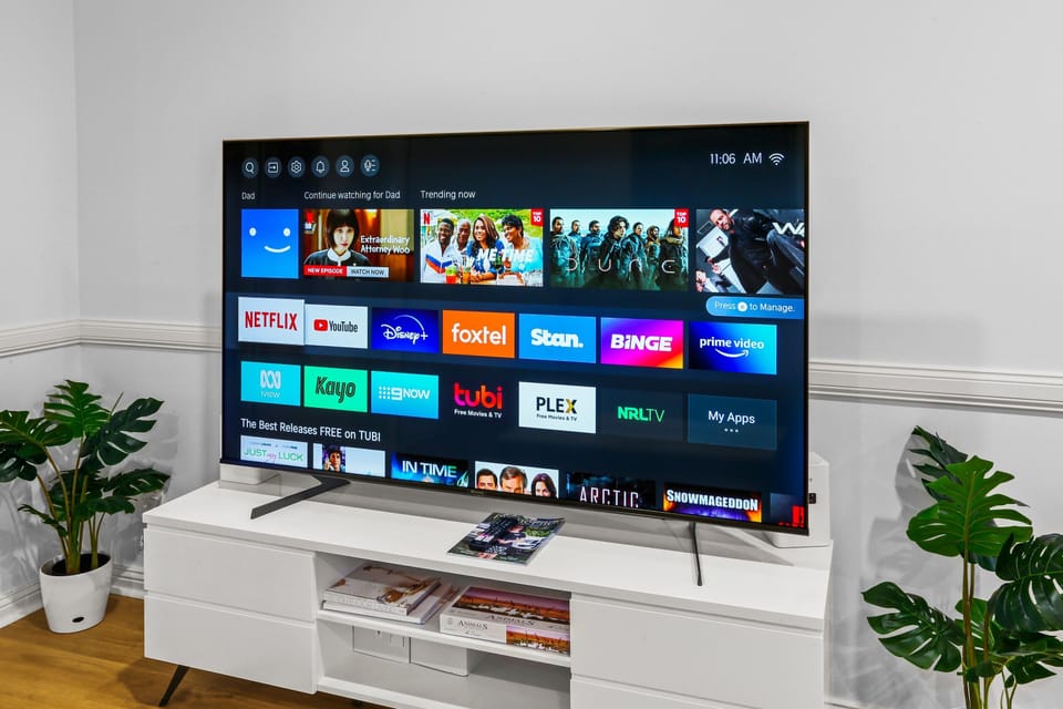 TV room with 76 inch smart TV