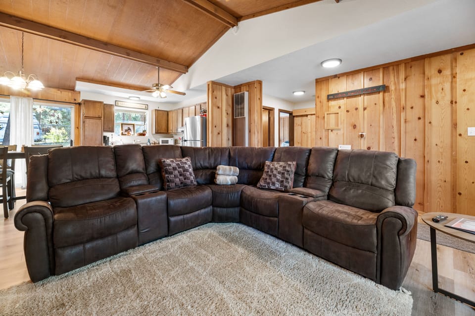 Sectional in living room surrounding fire place 