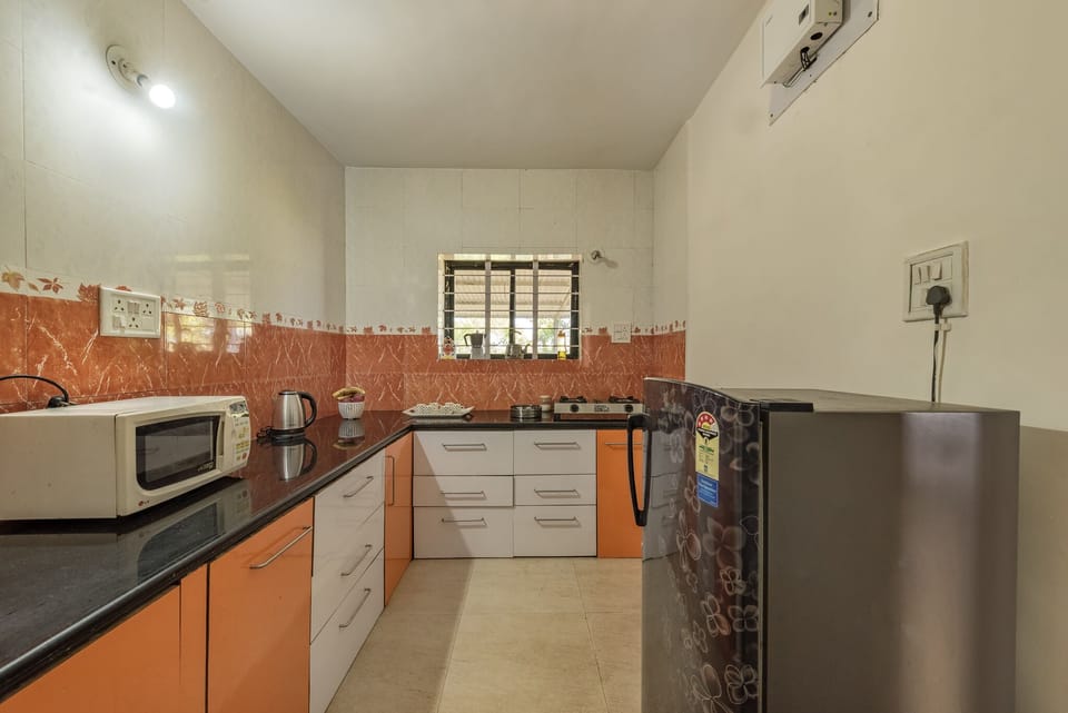 Fridge, microwave, coffee/tea maker, electric kettle