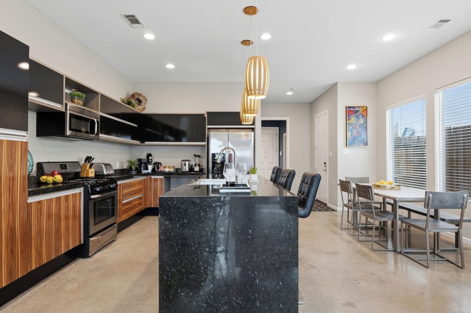 Spacious kitchen area, perfect for meal prep and enjoying meals together.