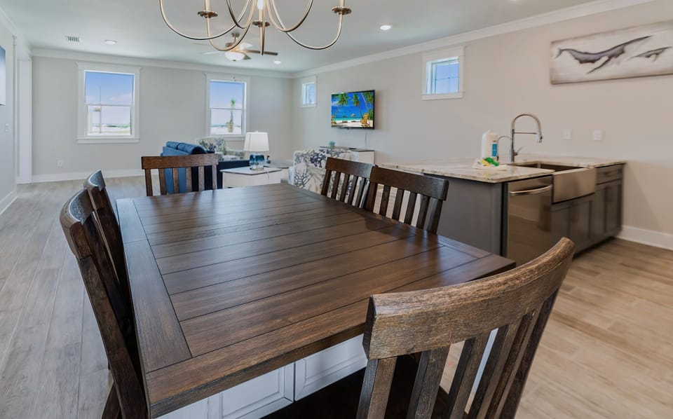 Seating for 10 between the dining table and kitchen bar