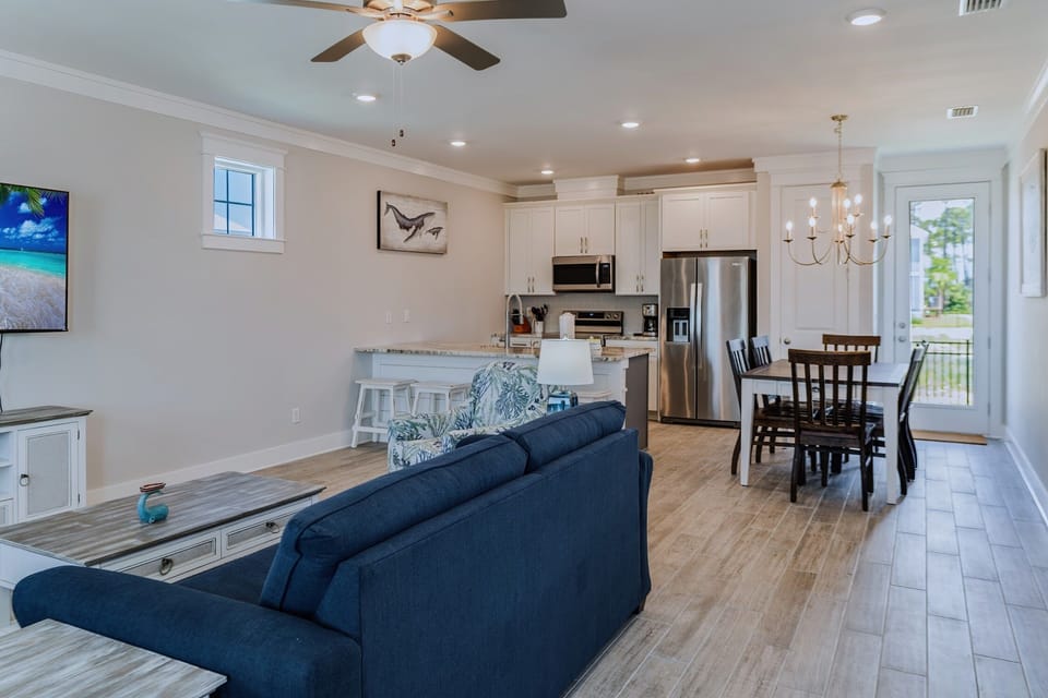Open floor plan with tall ceilings