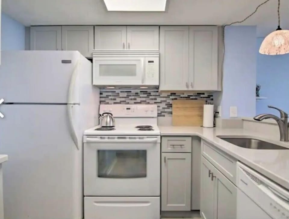 Amply stocked clean, updated kitchen with enough for 12+ 