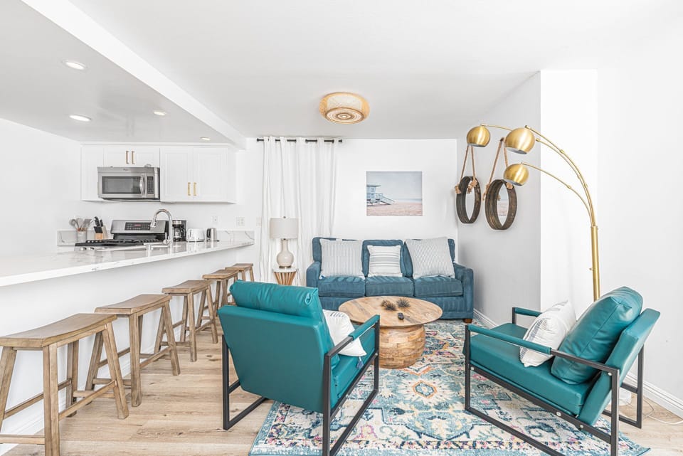 Newly renovated with style & comfort in mind, this downstairs beach home will sweep you off your feet and into vacation mode!
                