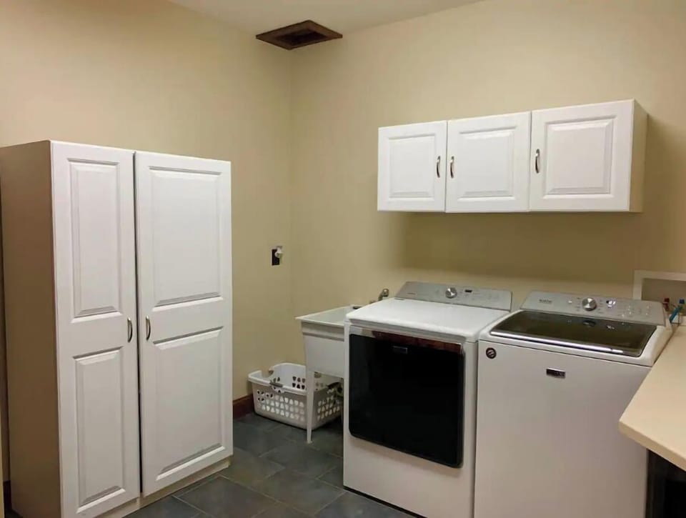 Large laundry room with shoot from 3rd floor