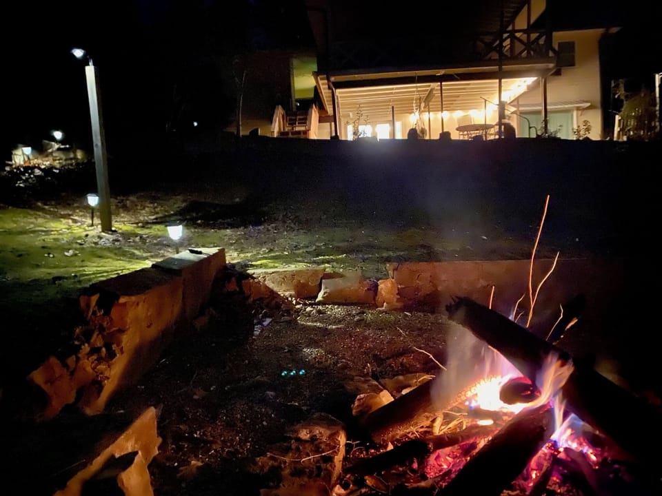 view of the home from the fire pit