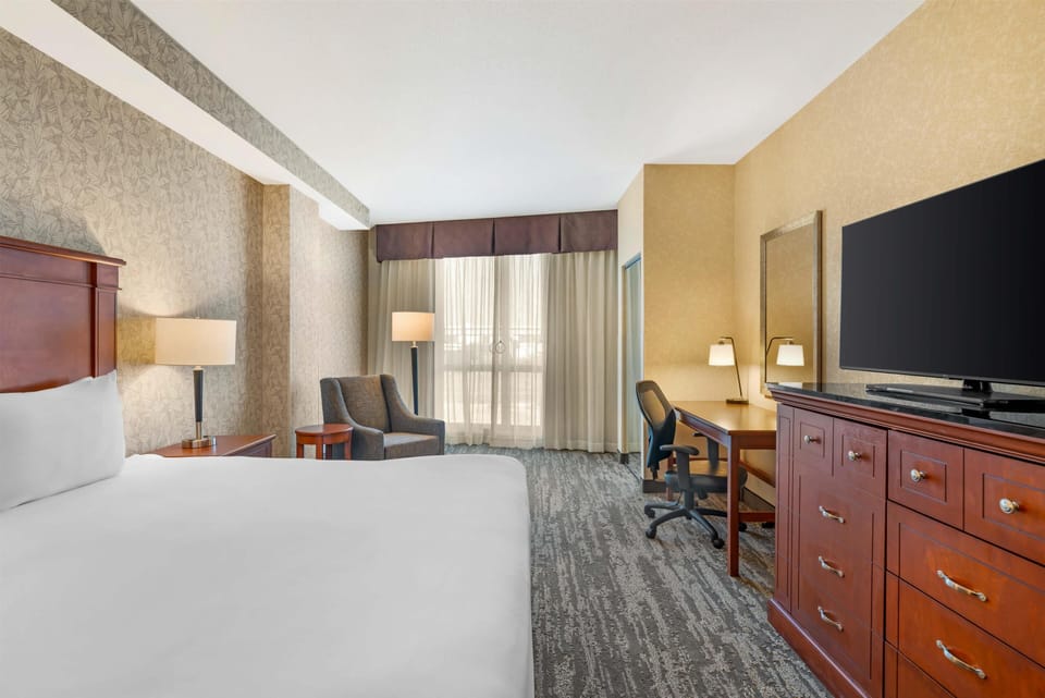 Room, 1 King Bed, Hearing Accessible (Roll in Shower) | In-room safe, desk, blackout drapes, iron/ironing board