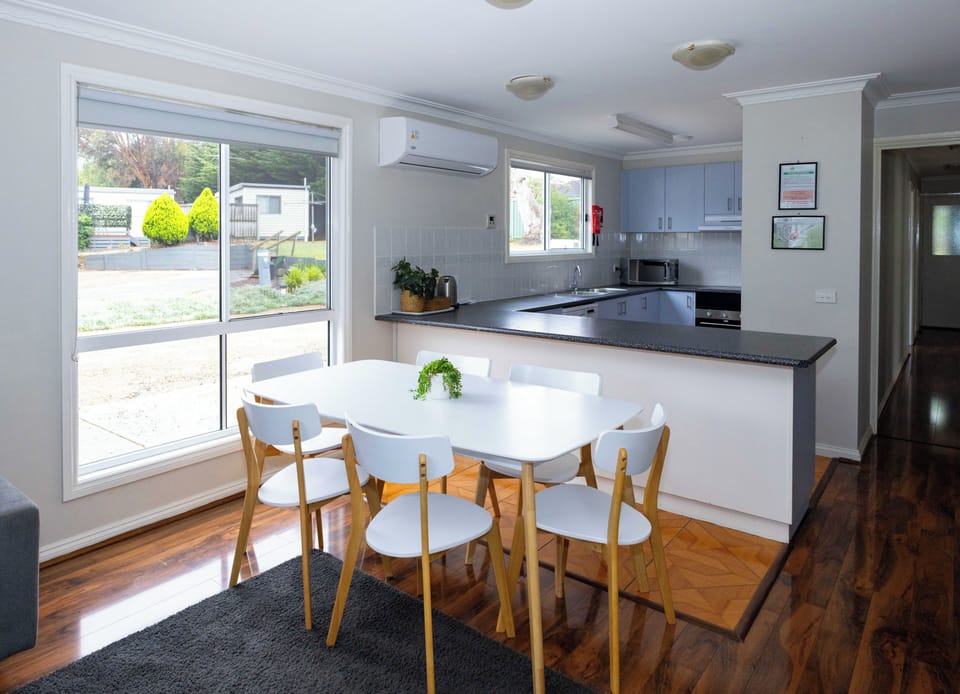 Deluxe Cabin, 4 Bedrooms | Private kitchen | Full-size fridge, microwave, oven, dishwasher