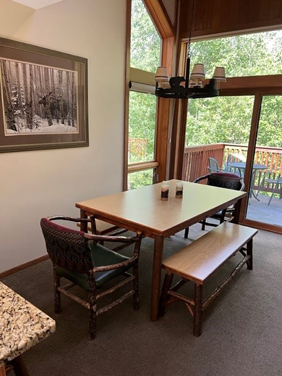 Dining table looking at the deck from the kitchen