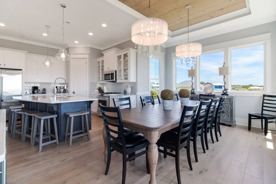 Large dining table with seating for 12 and an additonal 6 bar stools
