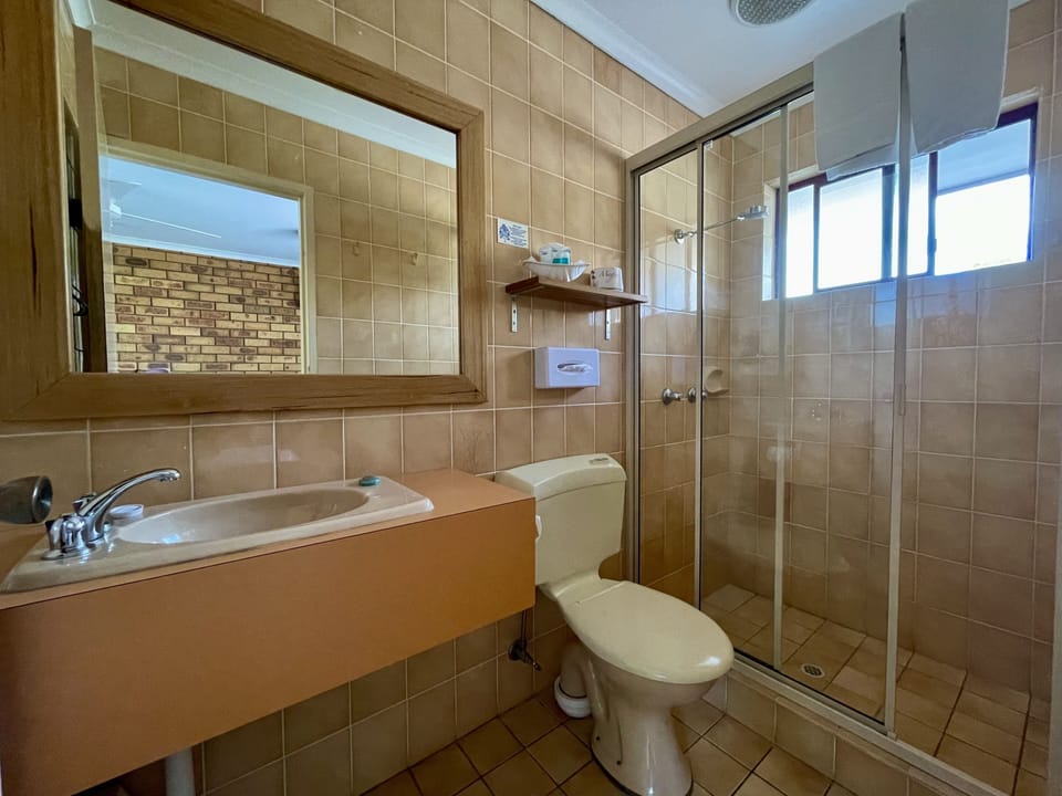 Shower, eco-friendly toiletries, hair dryer, towels