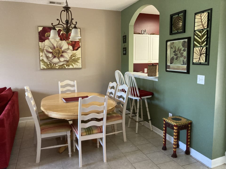 Table for six, breakfast bar for two! Plenty of space for game night!