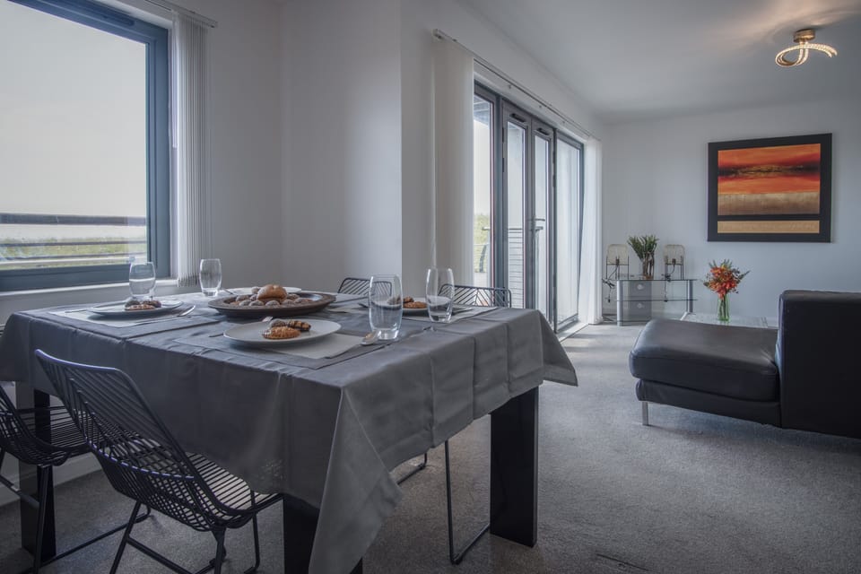 Exclusive Apartment | Living area | 50-inch Smart TV with digital channels, TV, streaming services