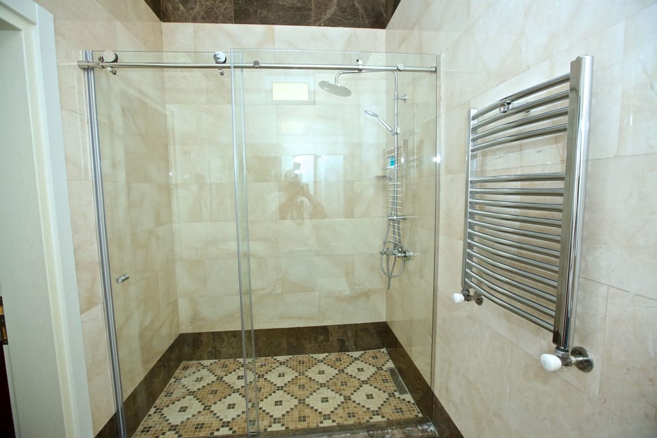 Standard Double Room | Bathroom | Separate tub and shower, rainfall showerhead, hair dryer, bathrobes