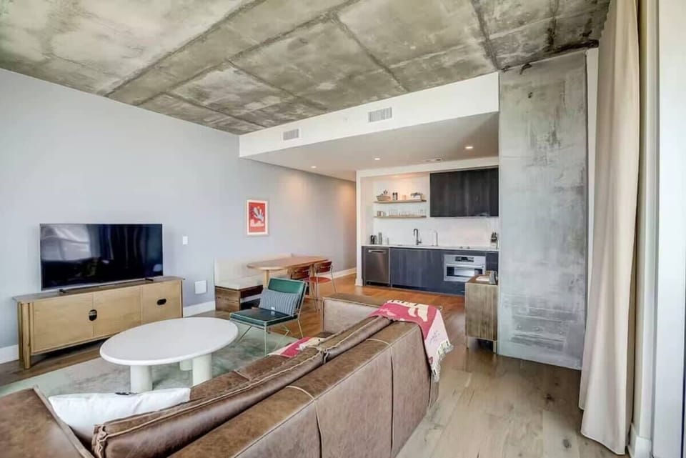 Open living room, dining area and kitchen