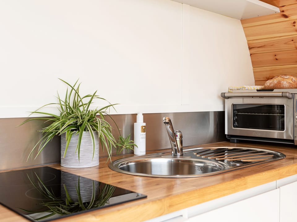Fridge, electric kettle, toaster, cookware/dishes/utensils