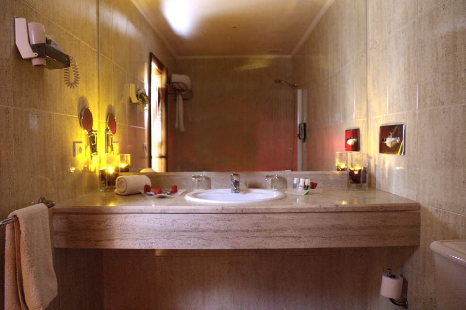 Honeymoon Suite, 1 King Bed, Balcony, Sea View | Bathroom | Bathtub, deep soaking tub, free toiletries, hair dryer