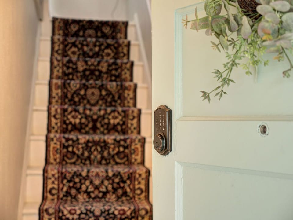 Entryway stairs leading up to apartment.