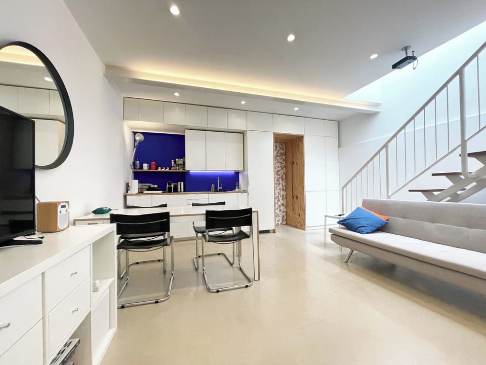Basement kitchen / diner with door to bathroom