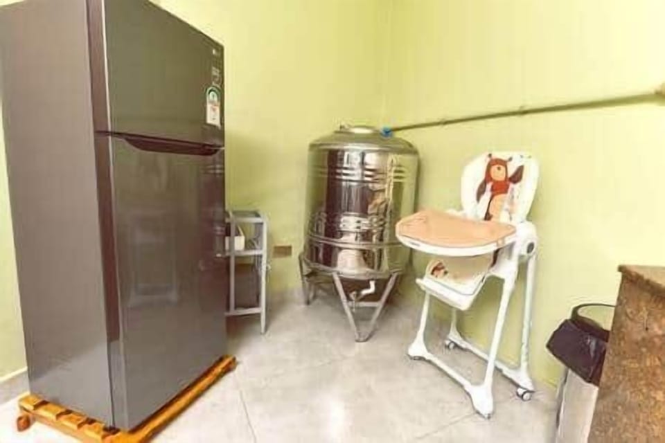 Fridge, high chair and water reserve tank