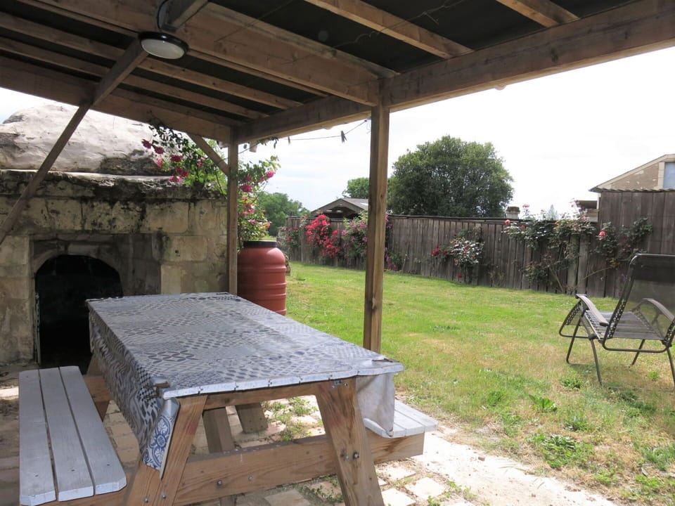 Plant, Table, Building, Outdoor Table, Wood, Shade, Outdoor Furniture, Tree, House, Chair