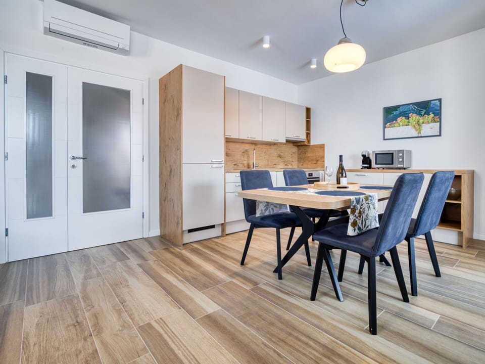 Table, Wood, Chair, Hall, Lighting, Interior Design, Floor, Flooring, Kitchen & Dining Room Table, Laminate Flooring