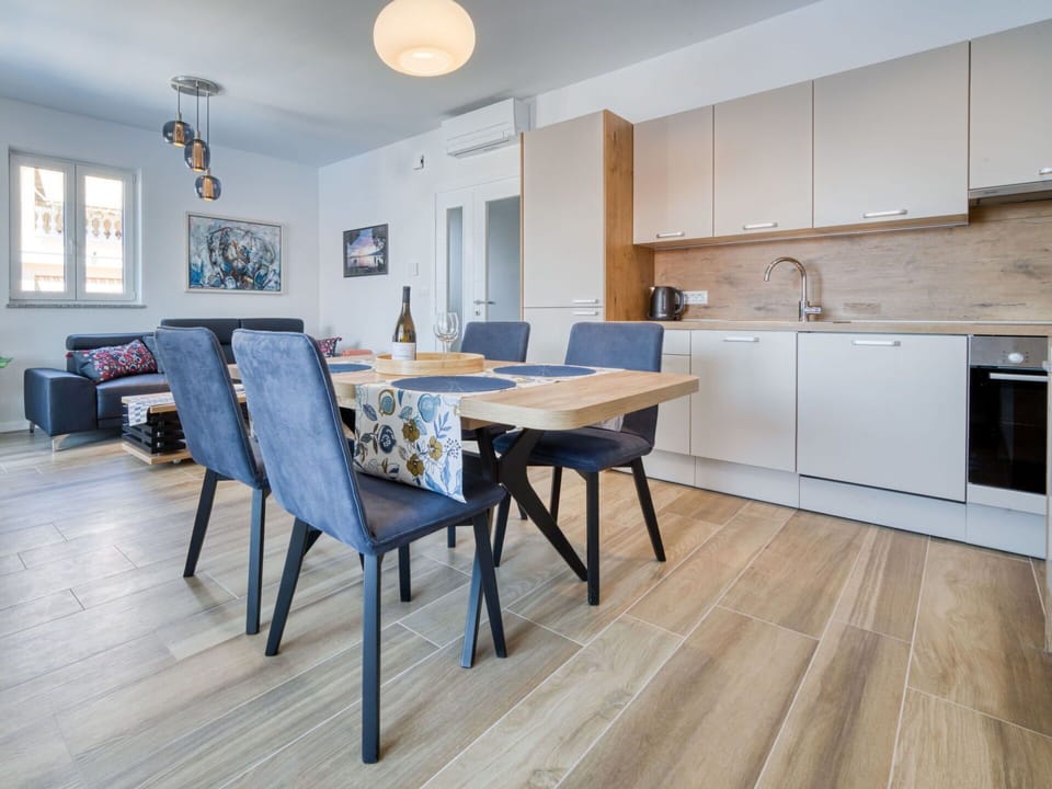 Table, Furniture, Window, Cabinetry, Building, Wood, Lighting, Countertop, Interior Design, Flooring