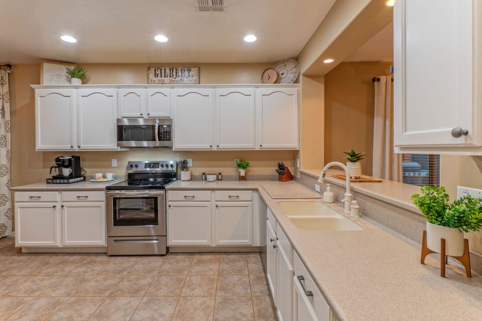 Kitchen has generous counter space for food and drink preps.