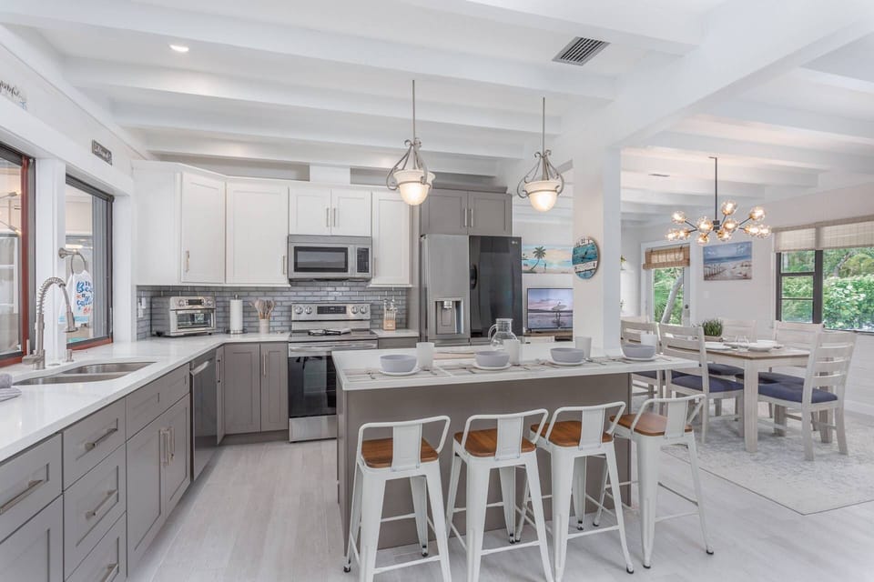 Fabulous kitchen made for a chef!  Plenty of seating at mealtimes.