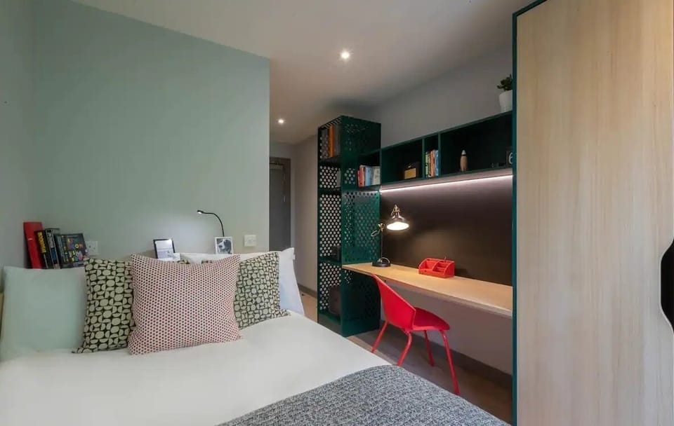 Desk, laptop workspace, free WiFi, bed sheets