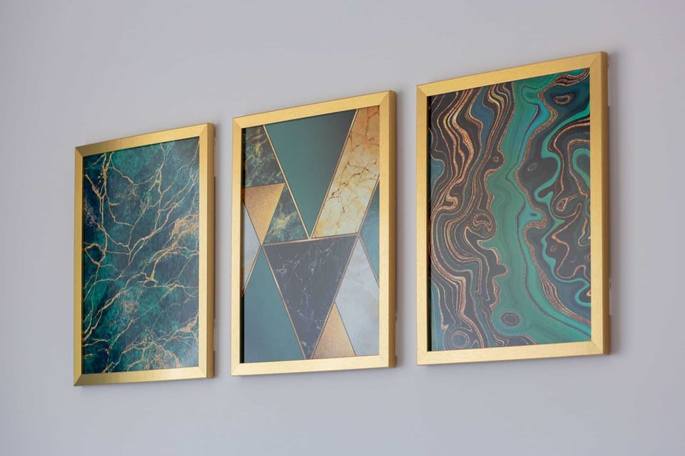 A set of three abstract paintings with geometric patterns and vibrant colors.