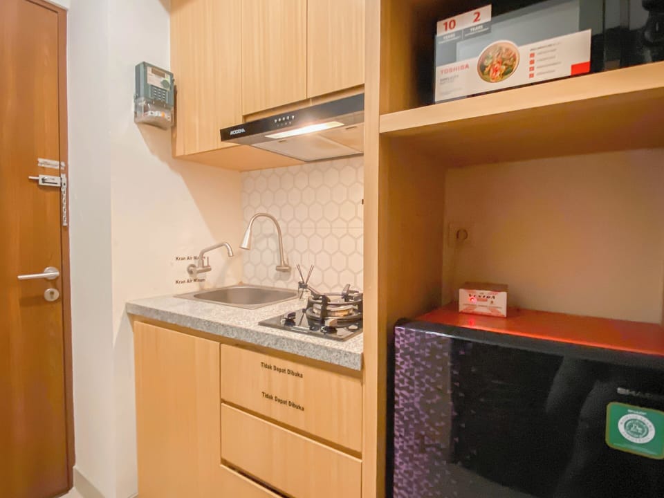 Apartment | Private kitchen | Fridge, microwave, stovetop, cookware/dishes/utensils