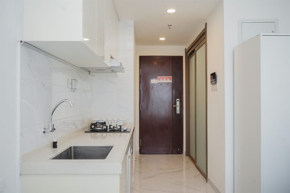 Apartment | Private kitchen | Fridge, stovetop, cookware/dishes/utensils, dining tables