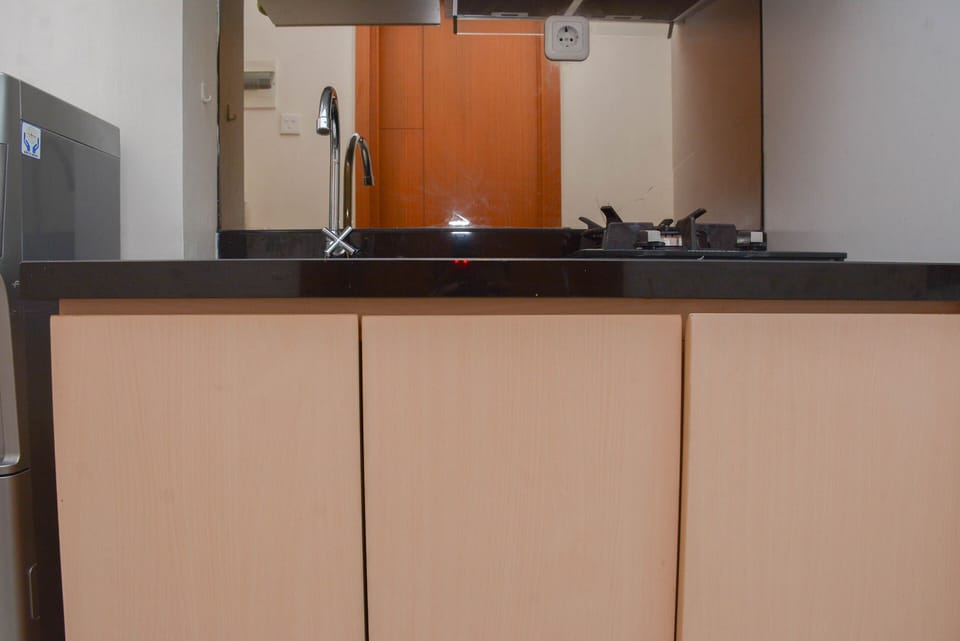 Fridge, stovetop, cookware/dishes/utensils, dining tables