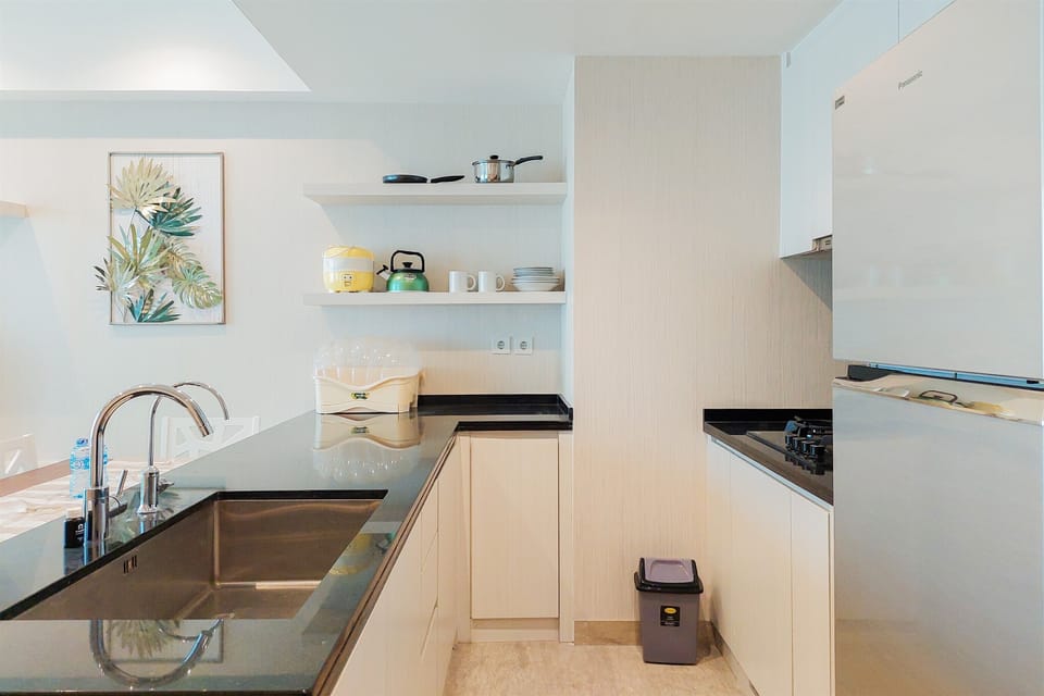 Fridge, stovetop, cookware/dishes/utensils, dining tables