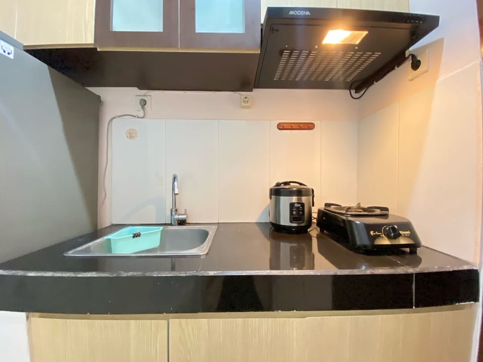 Fridge, stovetop, cookware/dishes/utensils, dining tables