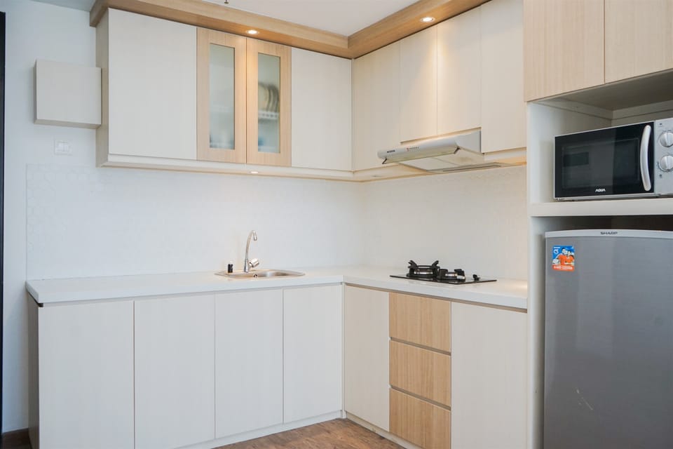 Apartment | Private kitchen | Fridge, stovetop, electric kettle, cookware/dishes/utensils
