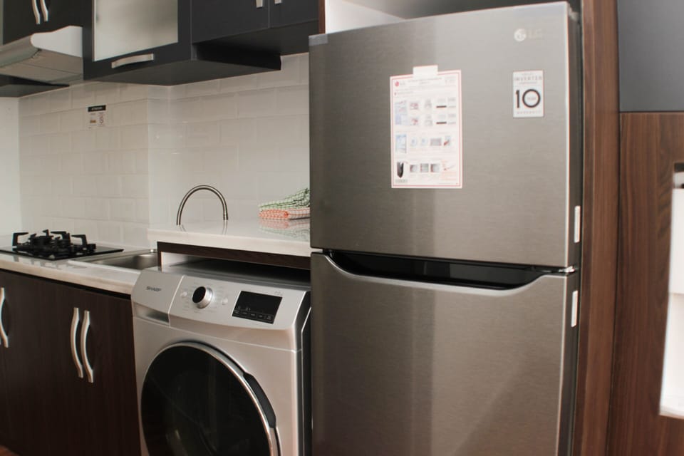 Fridge, stovetop, cookware/dishes/utensils, dining tables